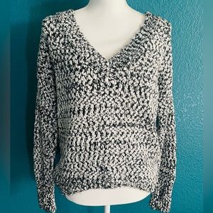 Brand new!! Med Size Black and V cut White Sweater